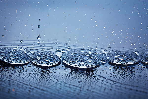 Accounting & Business Growth - Raindrops hitting water